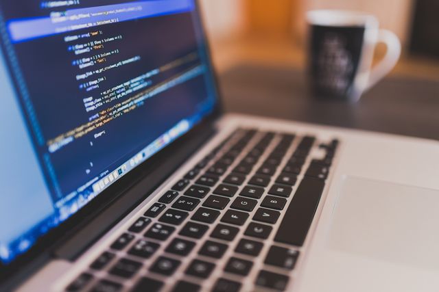 Laptop with source code on the screen